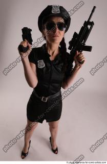 26 2019 01 NIKITA POLICEWOMAN WITH TWO GUNS